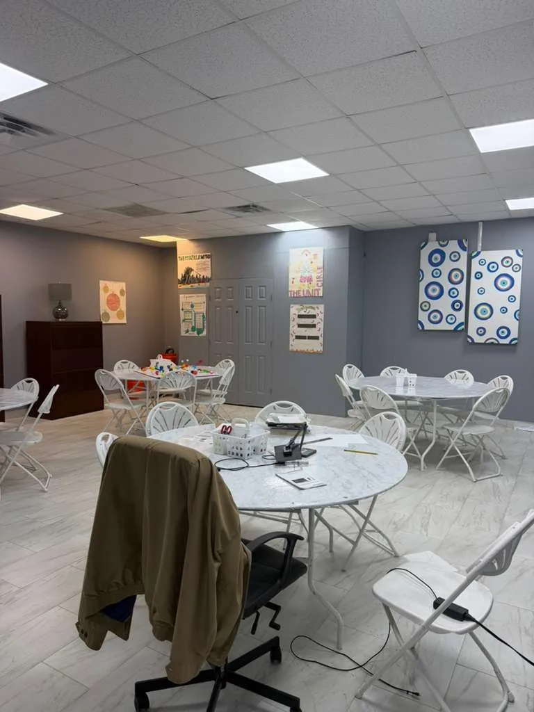Creative learning room with tables for hands-on student activities