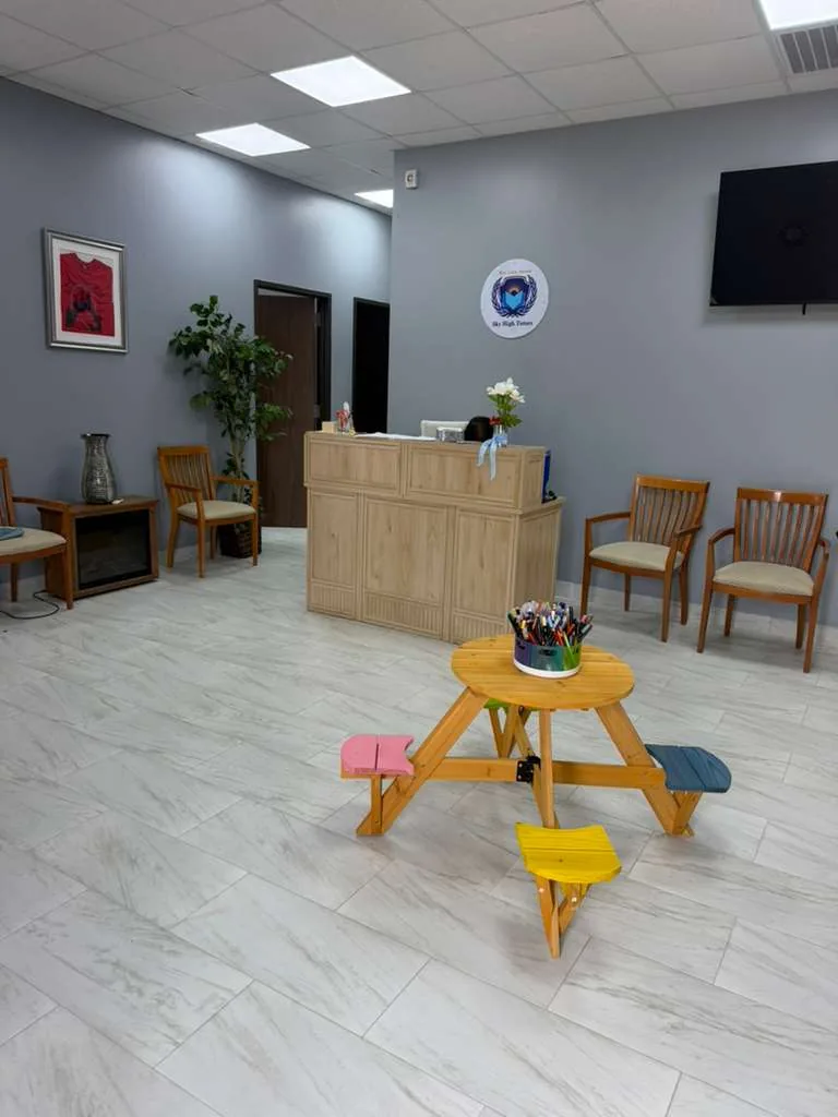 Welcome reception with an art and craft table for young learners